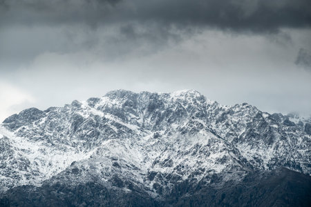 Snow capped peak of Monte Grosso standing at 1937 metres in the Balagne region of Corsica