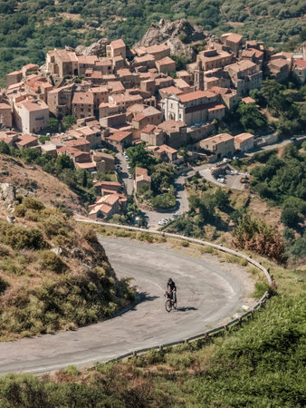 Speloncato, Corsica, France - 7th June 2022: StÃ©phane Lombard leads the 2022 BikingMan Corsica race after 750km as he tackles the 1100m Col de Battaglia above the village of Speloncato. Biking Man Corsica is an annual 1000km endurance cycling event circlのeditorial素材