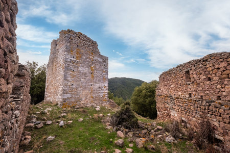 The ruins of Castellu di Seravalle, a military fortress built in the 11th century on a hilltop near the village of Popolasca in Corsicaのeditorial素材