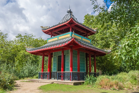 Victoria Park, Hackney, London, England - 29th July 2023: The Chinese Pagoda, originally built in 1842 at Hyde Park, now sits on West Lake at Victoria Park in Hackney, East Londonのeditorial素材