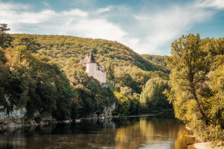 Pinsac, Dordogne, France - 16th September 2023: Built in 1352 as a fortress, Chateau de la Treyne stands on the banks of the Dordogne river in France and is now a luxury hotel and restaurant.のeditorial素材