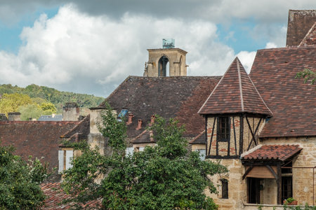 Sarlat-le-Caneda, France - 19th September 2023: Tourists enjoy the view of the rooftops of Sarlat in the Dordogne region of France from the panoramic viewing towerのeditorial素材