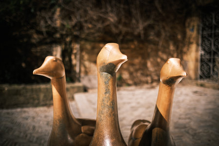 Sarlat-la-Caneda, Nouvelle-Aquitaine, France - 4th April 2024: Statue de trois Oies, a bronze statue of three geese, by Francois-Xavier Lalanne in Sarlat-la-Caneda in the Dordogne region of Franceのeditorial素材