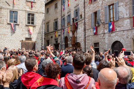 GUBBIO, ITALY - MAY 15 2016 - The Saint Antonio Ceri is blessed by a nun is it is pararded around the city of Gubbio at the annual Festa dei Ceri.のeditorial素材