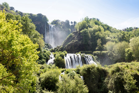 Marmore Falls, Umbria, Italy (Cascata delle Marmore) - a man-made waterfall created by the ancient Romans located near Terni in Umbria region, Italy. The waters are used to fuel an hydroelectric power plantの写真素材
