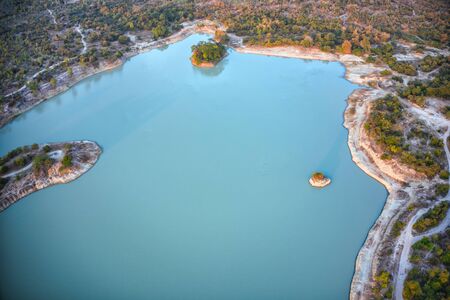 This unique photo shows the islands and structure of a reservoir in Hua Hin Thailand from above. The picture was taken with a drone.の写真素材