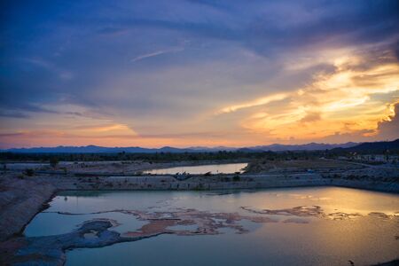 This unique photo shows the hilly landscape with lakes, from hua Hin in thailand, taken with a drone during a fantastic sunset!の写真素材