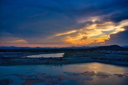 This unique photo shows the hilly landscape with lakes, from hua Hin in thailand, taken with a drone during a fantastic sunset!の写真素材