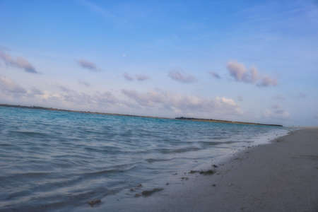 this unique image is the natural pristine beach of an island in the Maldives. It is the last paradise on earthの写真素材