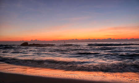 This great photo shows the sunrise of Hua Hin in Thailand early morning at sunrise. You can see very well the coast of the gulf of Thailandの写真素材