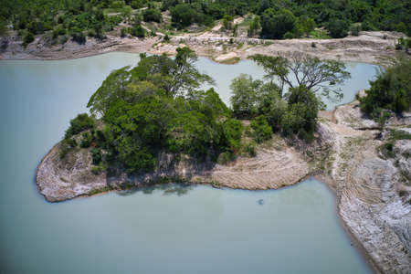 This unique photo shows the islands and structure of a reservoir in Hua Hin Thailand from above. The picture was taken with a drone.の写真素材