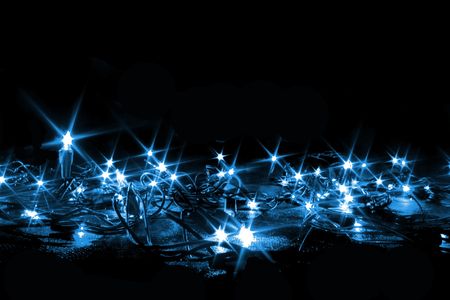 xmass blue ligts on the black backgroundの写真素材