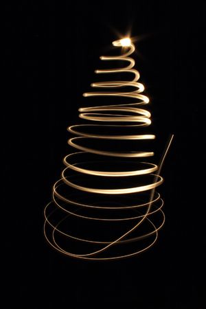 xmas tree from the lights on the black backgroundの写真素材