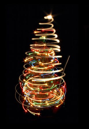 xmas tree from the lights on the black backgroundの写真素材