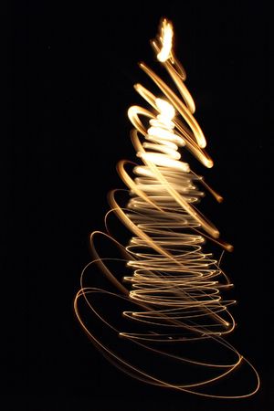 xmas tree from the lights on the black backgroundの写真素材