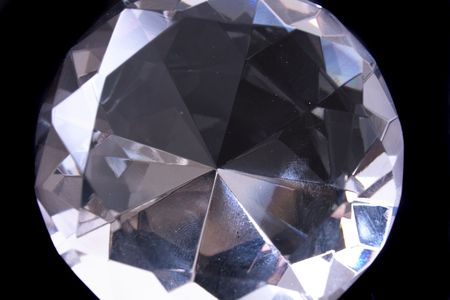 beautiful diamond on the black glass  backgroundの写真素材