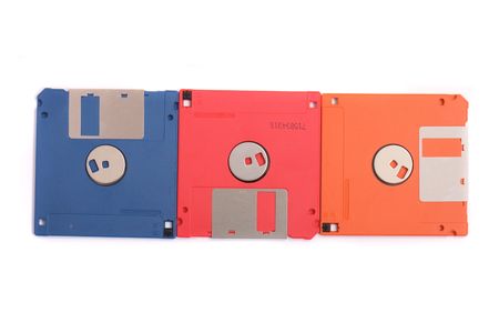 color floppy disks on the white backgroundの写真素材