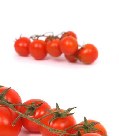 fresh red tomatoes on the white backgroundの写真素材