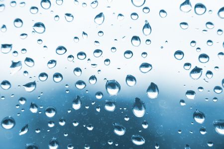 water drops texture in the blue color 