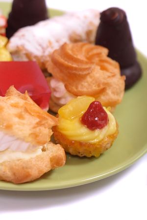 many sweet deserts on the white backgroundの写真素材