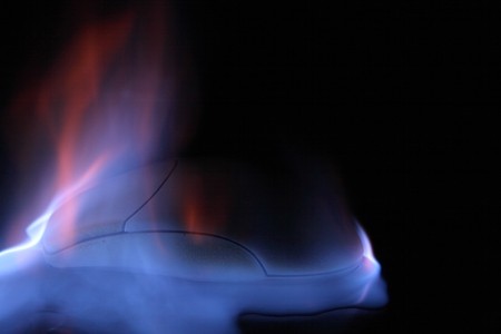 mouse in the fire on the black backgroundの写真素材