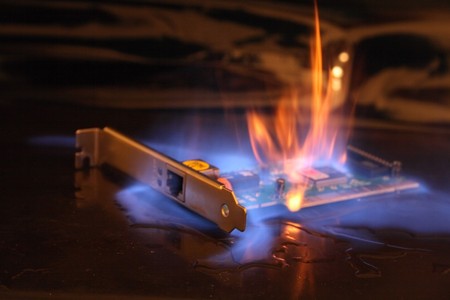 net card in the fire on the black backgroundの写真素材