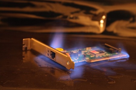 net card in the fire on the black background