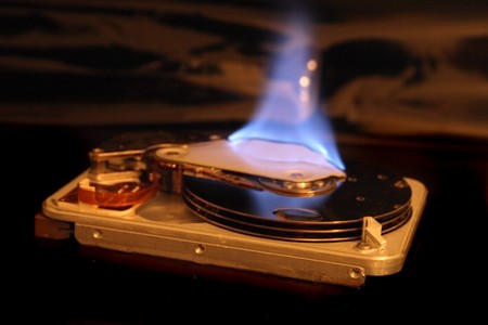 disc in the fire on the black backgroundの写真素材