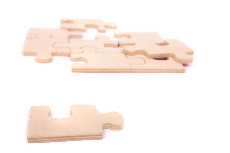 pieces of puzzle on the white backgroundの写真素材