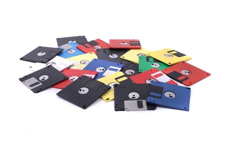 fdd disks in the different colors on the white backgroundの写真素材