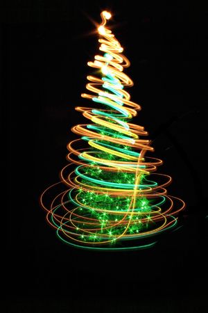 xmas tree (lights) on the black backgroundの写真素材