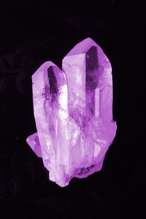 violet amethyst isolated on the black backgroundの写真素材