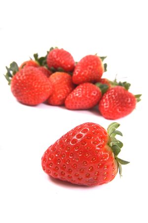 red strawberries isolated on the white backgroundの写真素材