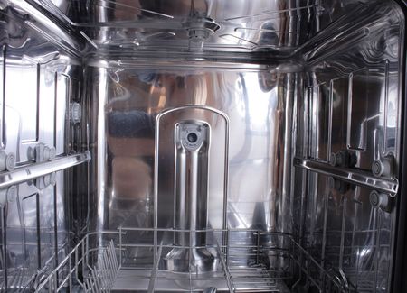 new empty dishwasher as original kitchen backgroundの写真素材