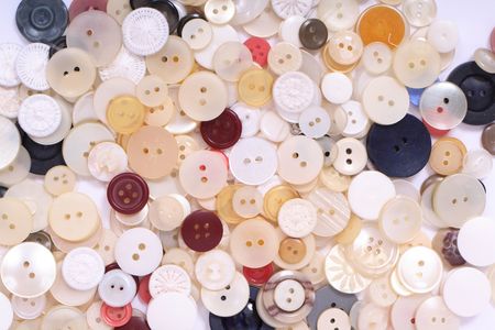 very old color buttons on the white backgroundの写真素材