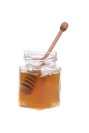 fresh honey isolated on the white backgroundの写真素材