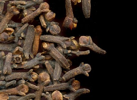 detail of clove grocery on the black backgroundの写真素材