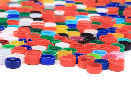 rainbow background from different colors plastic caps の写真素材