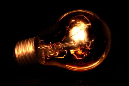 light bulb isolated on the black backgroundの写真素材