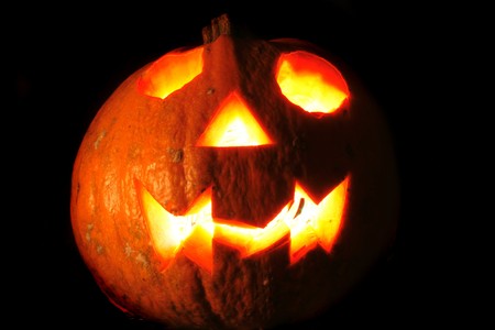 pumkin with ligths in dark halloween symbolの写真素材
