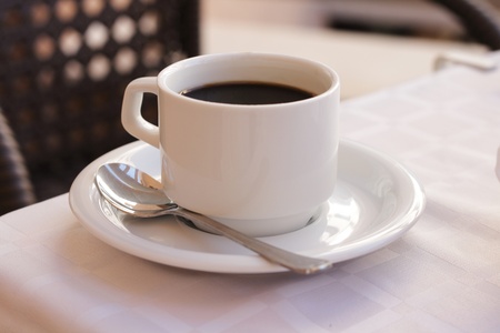 fresh cup of cafe on the table の写真素材