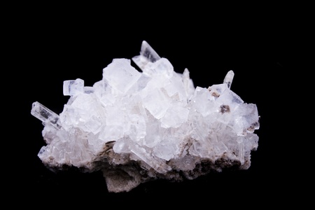 salt crystals isolated on the black backgroundの写真素材