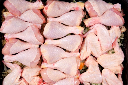 raw chicken legs as nice food backgroundの写真素材