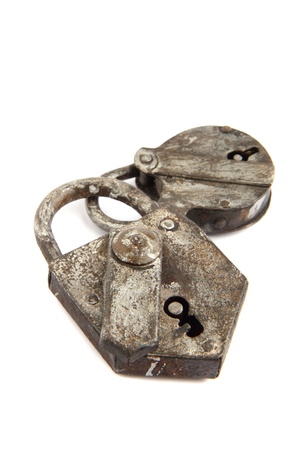 old padlock isolated on the white backgroundの写真素材