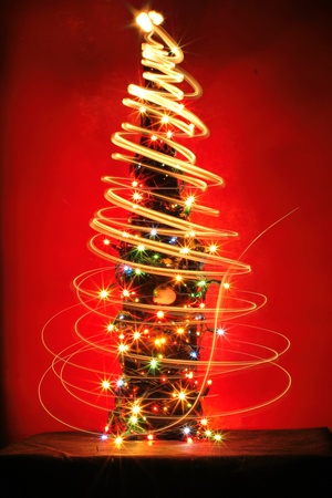 christmas alcohol as xmas tree from the color lightsの写真素材