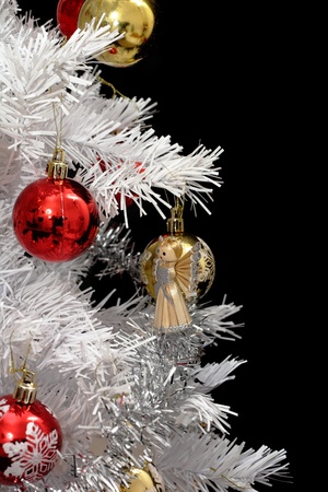 christmas tree isolated on the black backgroundの写真素材