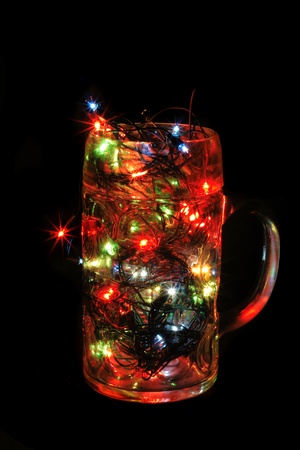 xmas tree (lights) in the beer glassの写真素材