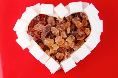 valentine heart from the sugar on the red backgroundの写真素材