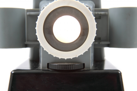 old projector  diascope from 1950  isolated on the white background