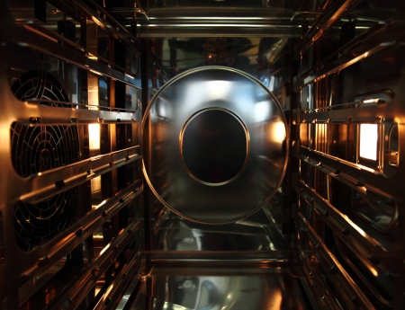 steel open oven as nice new kitchen background の写真素材